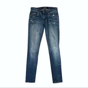 Driftwood Medium Wash Mid Rise Skinny Jeans